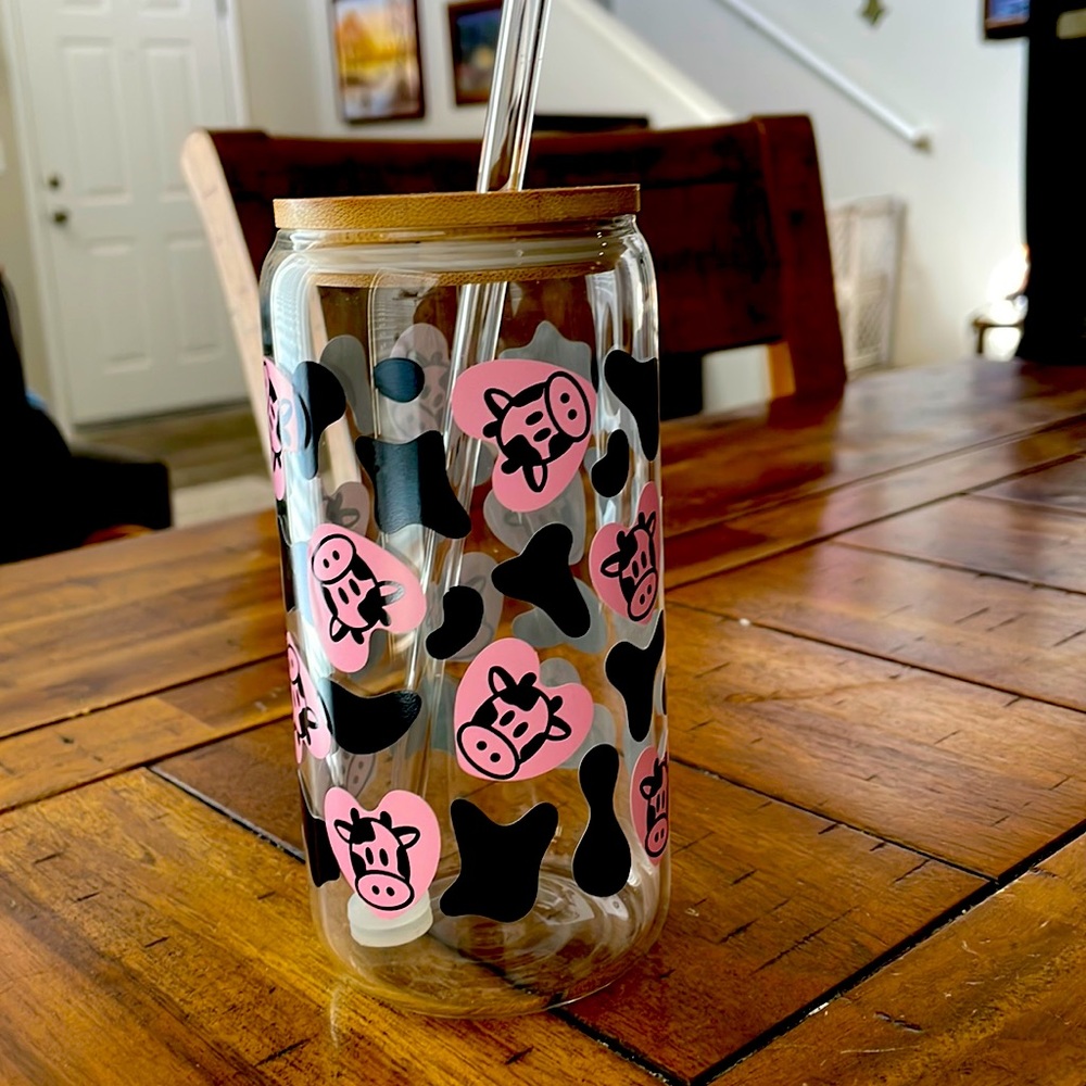 Glass tumbler  pink and black cows.